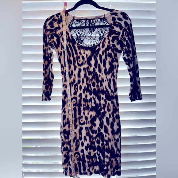 Guess cheetah print stretchy dress with black lace in the back. - Picture 4 of 13